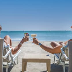 Private beach nearby, beach umbrellas, beach towels, beach bar