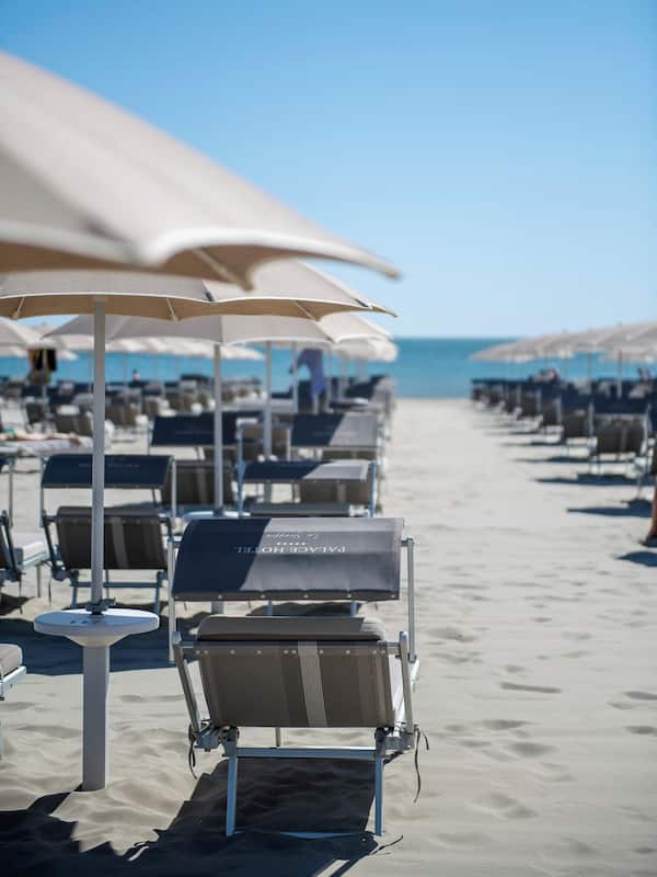 Private beach nearby, beach umbrellas, beach towels, beach bar