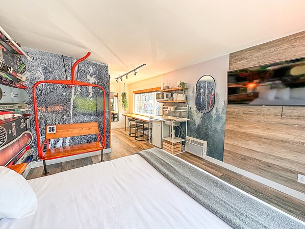 Designer Room, 1 King Bed, Mountain View | Minibar, individually decorated, blackout drapes, free WiFi