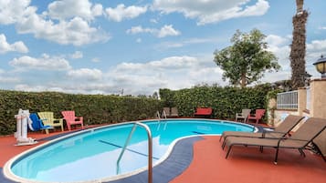 Outdoor pool, pool umbrellas, sun loungers