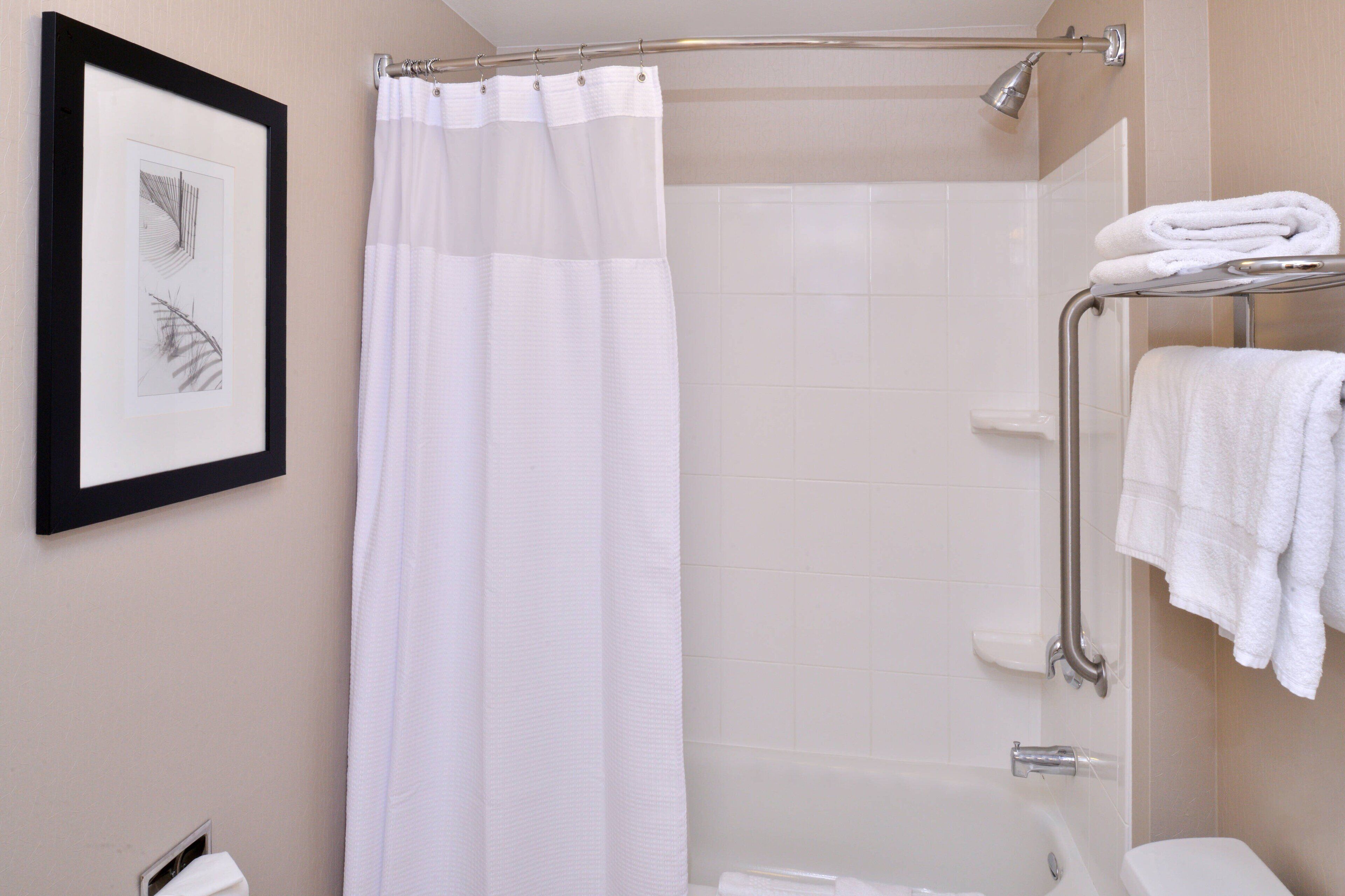 combined shower/bathtub, free toiletries, hair dryer, towels