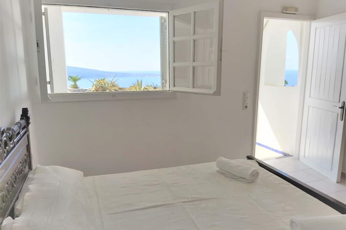 Economy Quadruple Room (Sea & Sunset view) | 2 bedrooms, individually decorated, individually furnished, desk