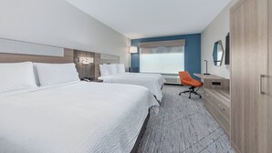 A hotel room with two beds, a desk, a chair, a wardrobe, and a large window with a view. - Holiday Inn Express Suites Beeville by IHG (Beeville)