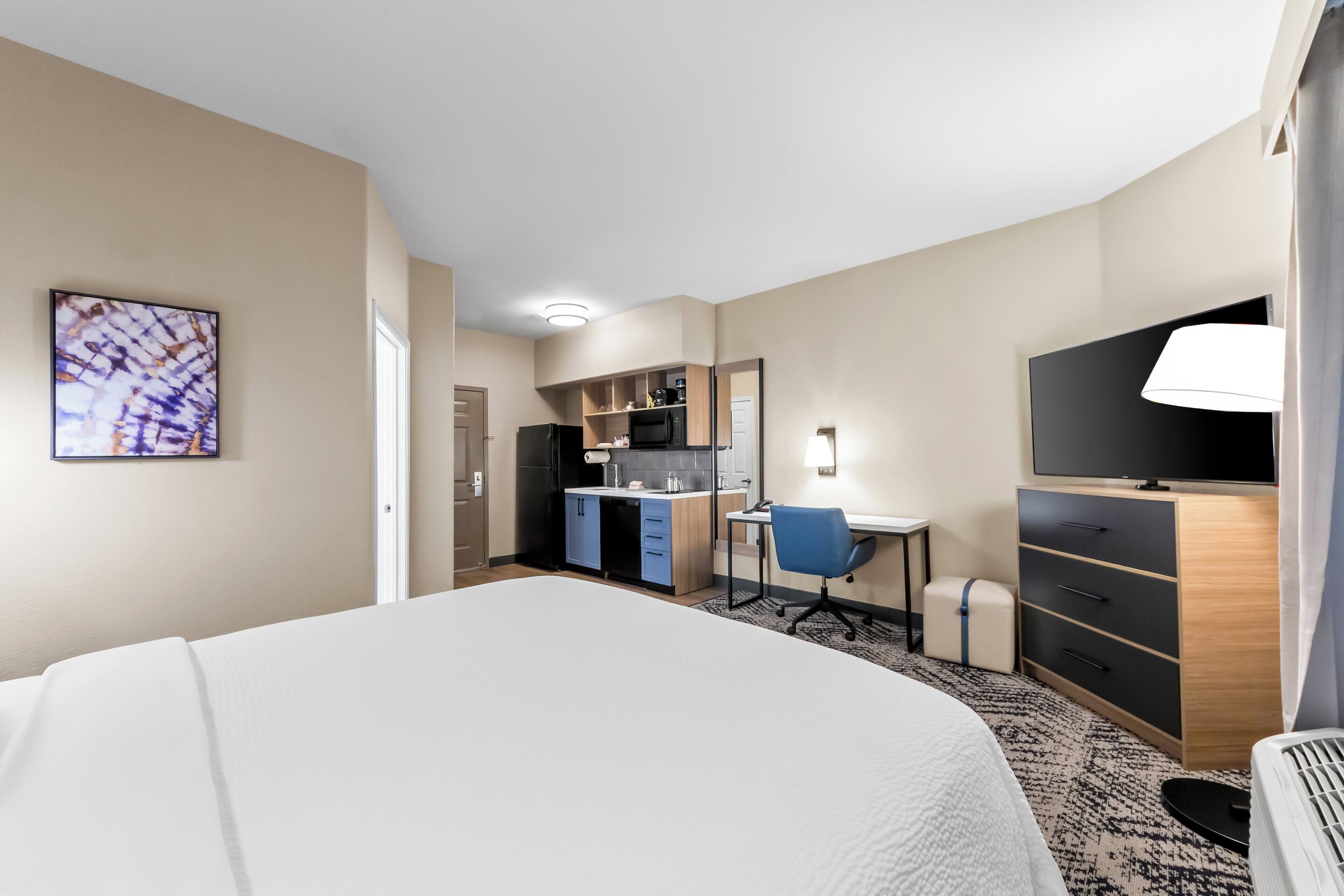 Desk, laptop workspace, blackout curtains, iron/ironing board