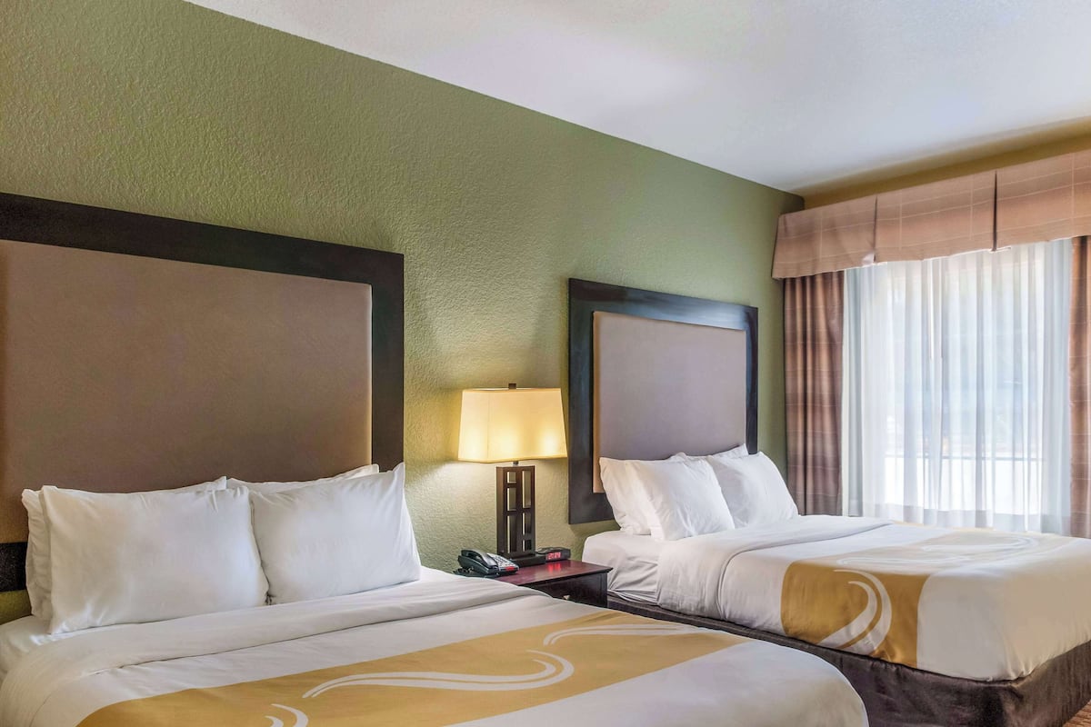 Standard Room, 2 Queen Beds, Non Smoking | Pillowtop beds, in-room safe, desk, blackout drapes