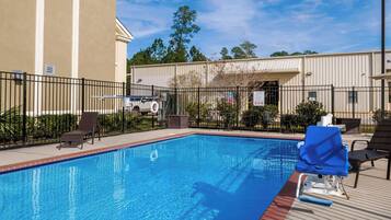 Outdoor pool, pool umbrellas, sun loungers