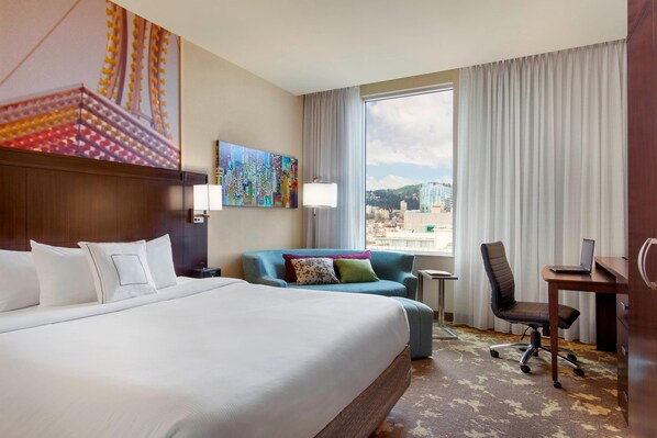 Habitación, 1 cama King size | Ropa de cama de alta calidad y caja de seguridad en la habitación 