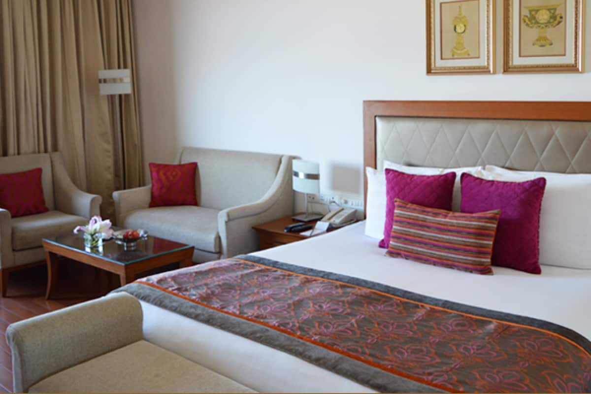 Habitación | Ropa de cama de alta calidad, edredón, camas Select Comfort y minibar
