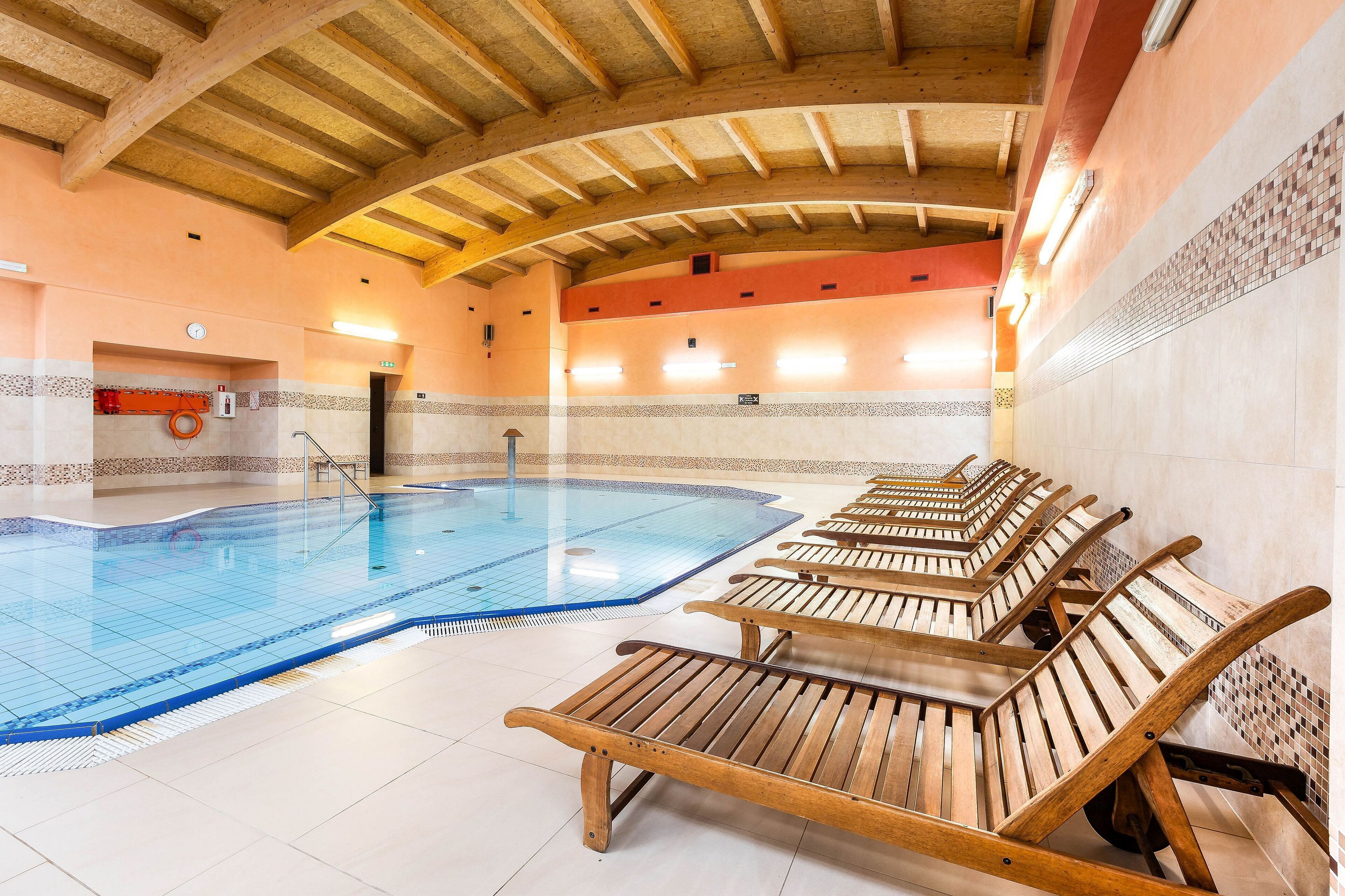 indoor pool, pool loungers