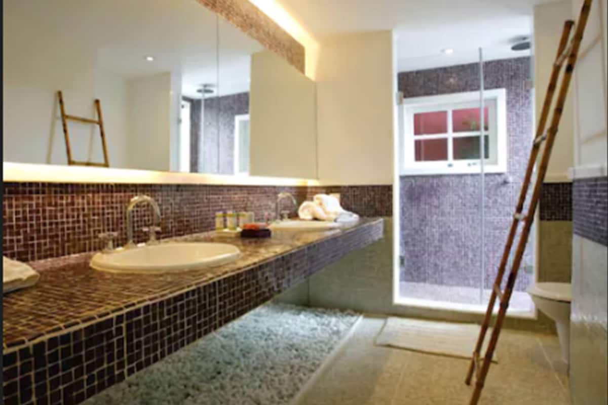 hair dryer, bathrobes, slippers, towels