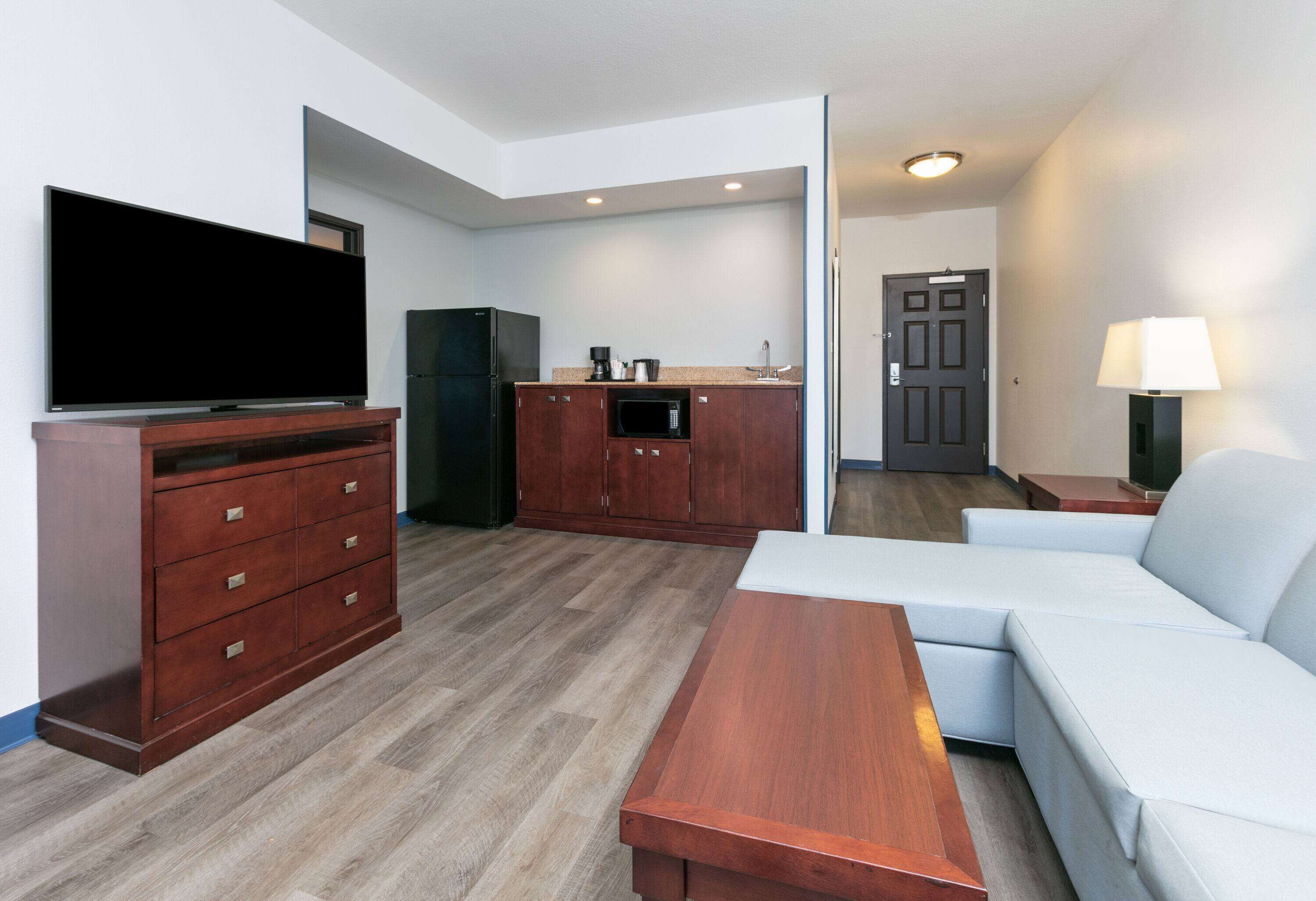 premium bedding, desk, laptop workspace, iron/ironing board