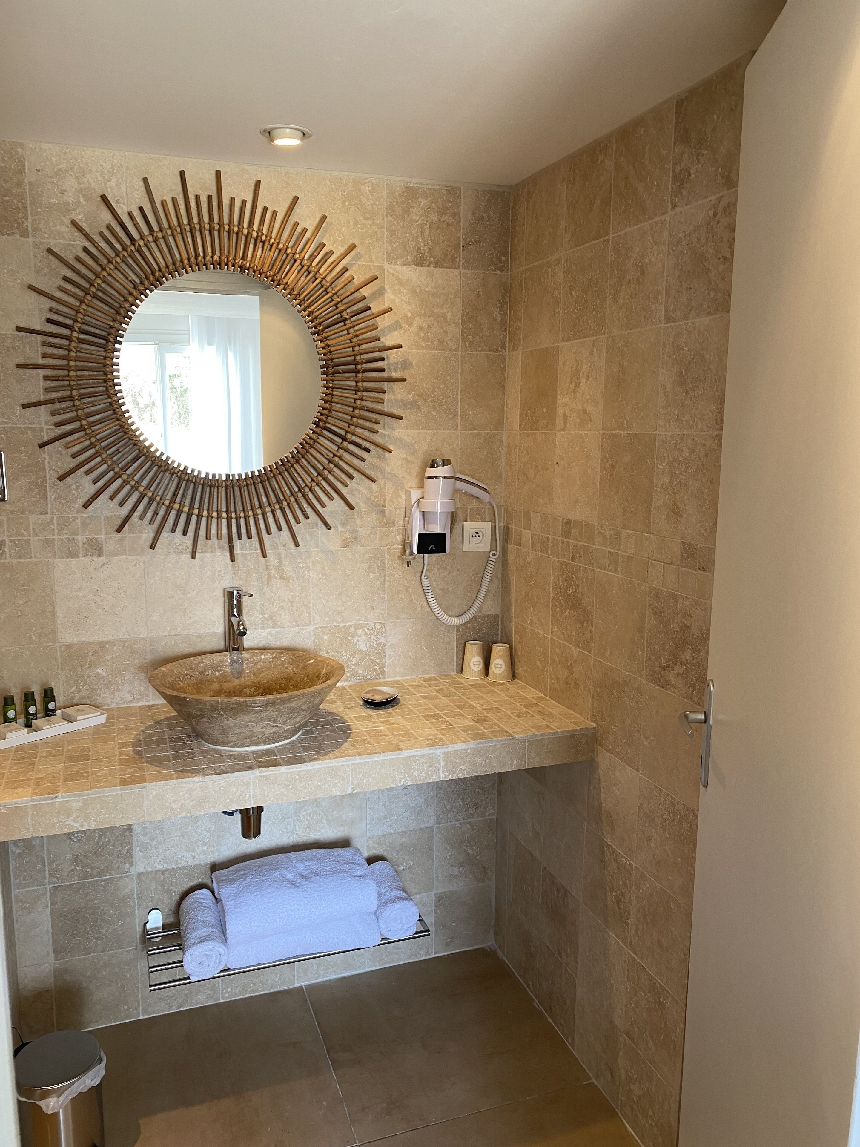 hair dryer, bathrobes, slippers, towels