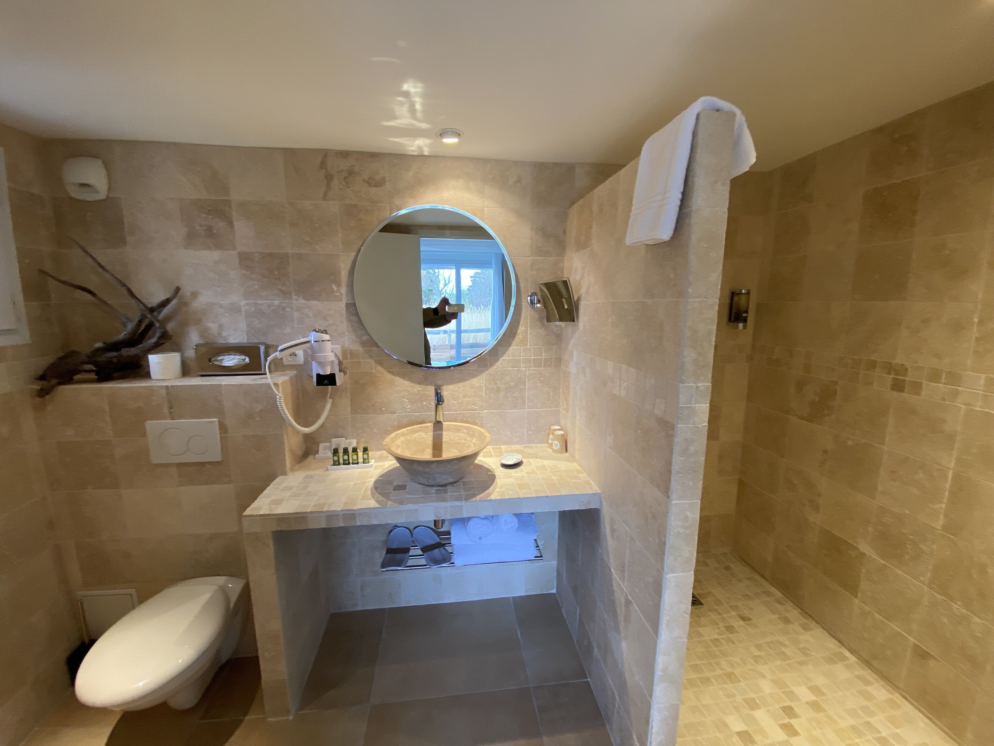 hair dryer, bathrobes, slippers, towels