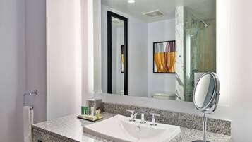 Designer toiletries, hair dryer, towels