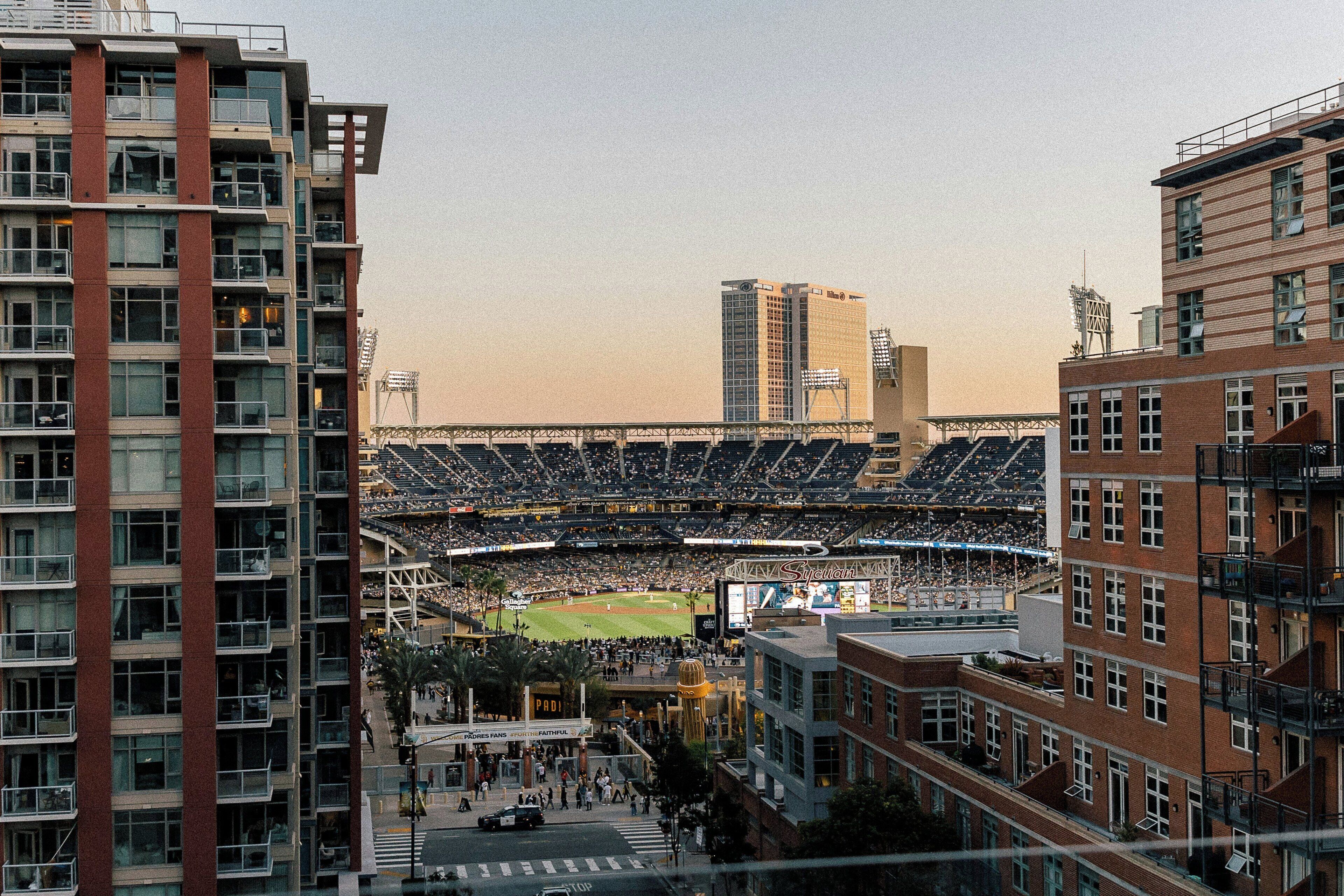 A stadium with multiple levels of seating and a clear view of the field.