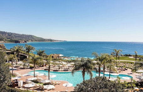 4 outdoor pools, cabanas (surcharge), pool umbrellas