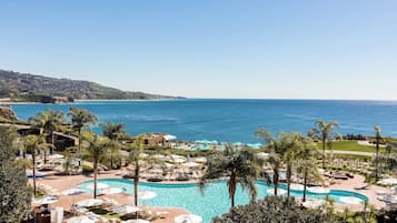 4 outdoor pools, cabanas (surcharge), pool umbrellas