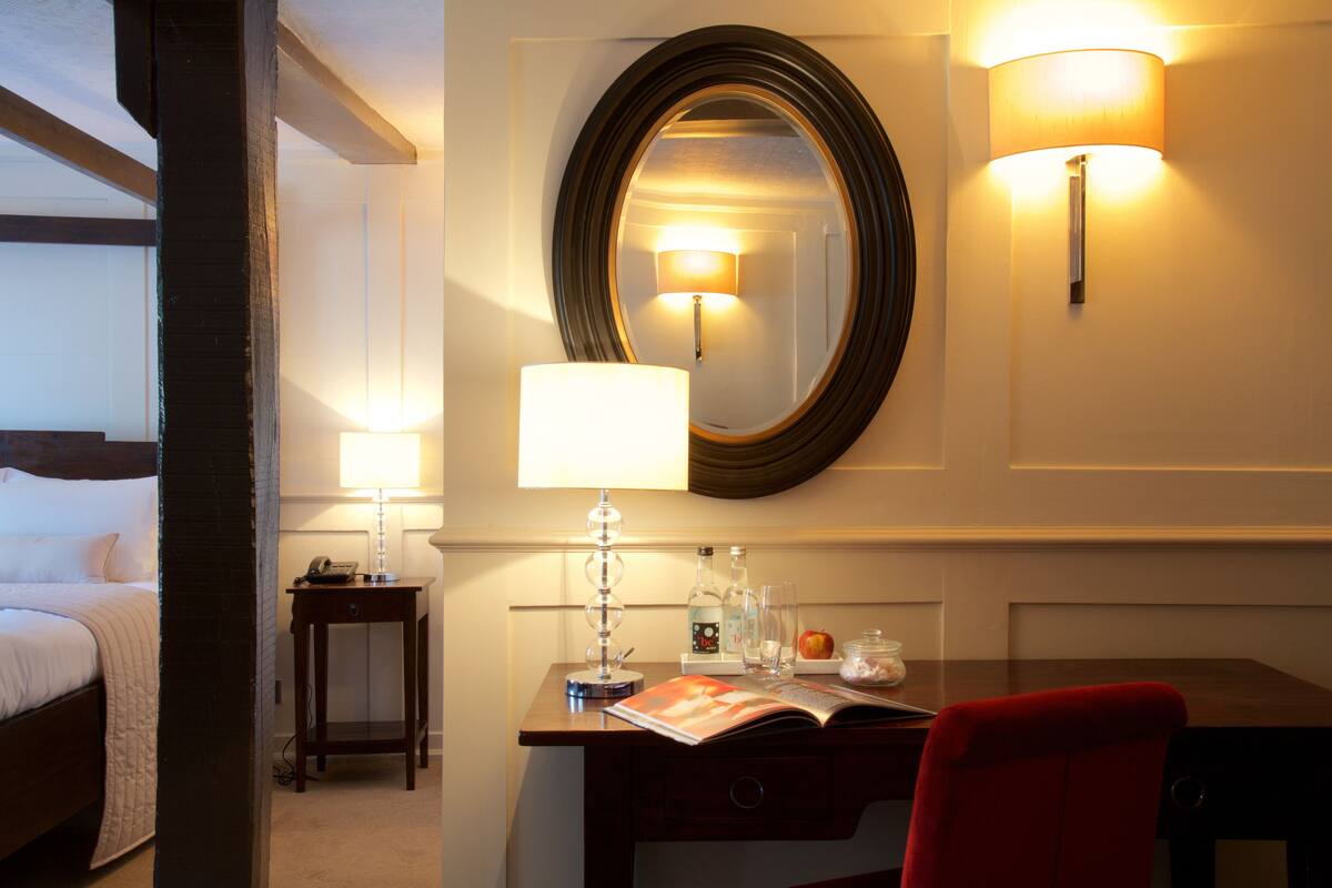 deluxe double room | in-room safe, desk, blackout curtains, iron/ironing board