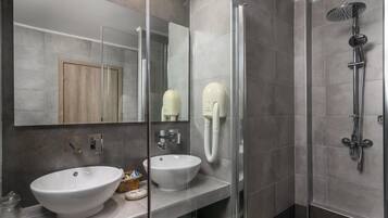 Shower, free toiletries, hair dryer, towels