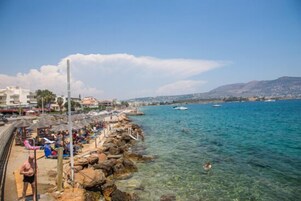 On the beach, sun loungers, beach umbrellas, beach towels