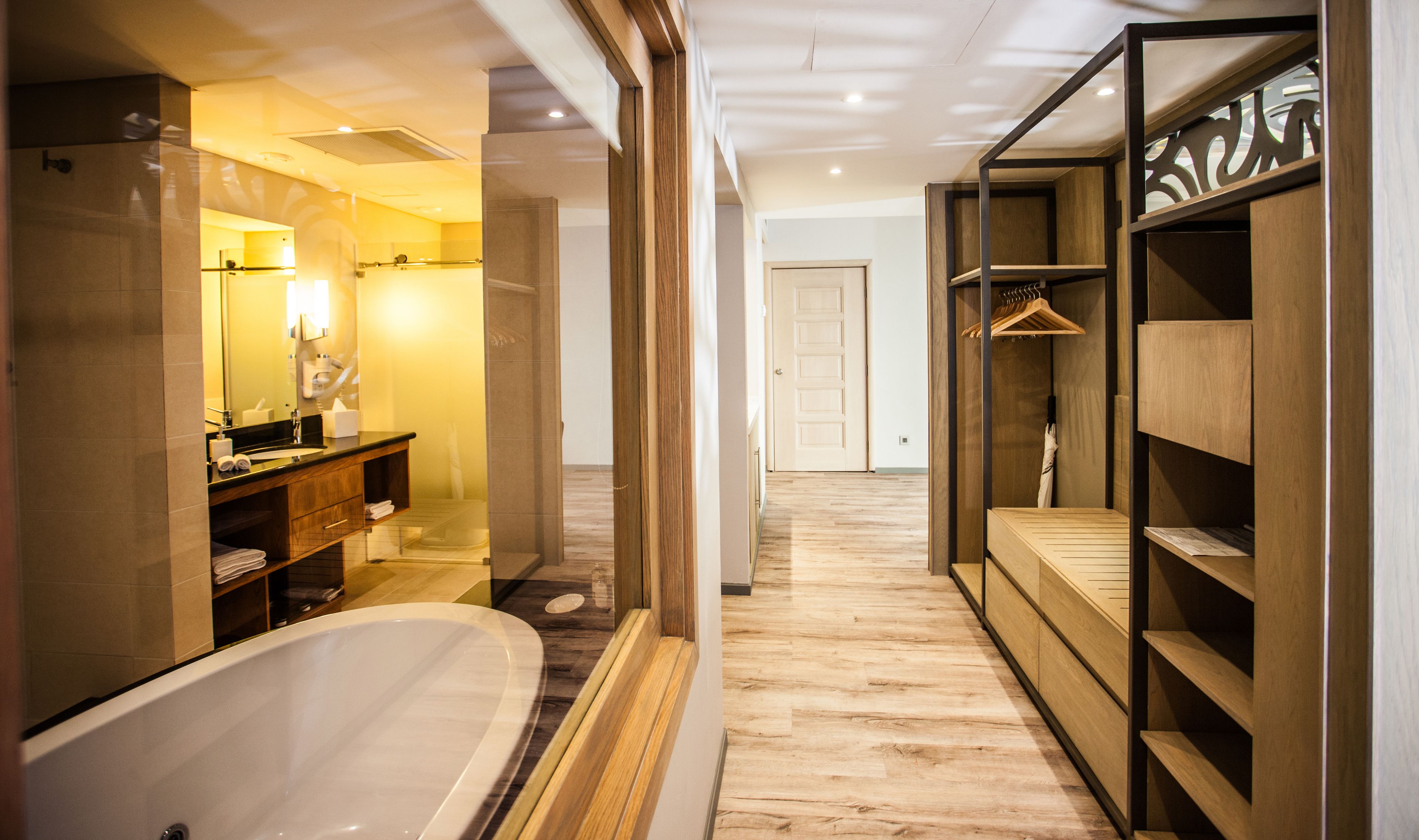 junior suite | bathroom | shower, hair dryer, bathrobes, slippers