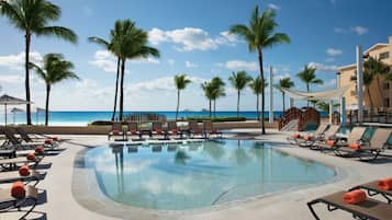 3 outdoor pools, a heated pool, open 7:00 AM to 7:00 PM, pool umbrellas