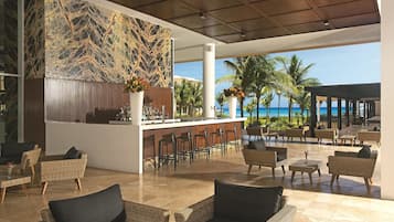 3 bars/lounges, 2 swim-up bars, poolside bar, beach bar