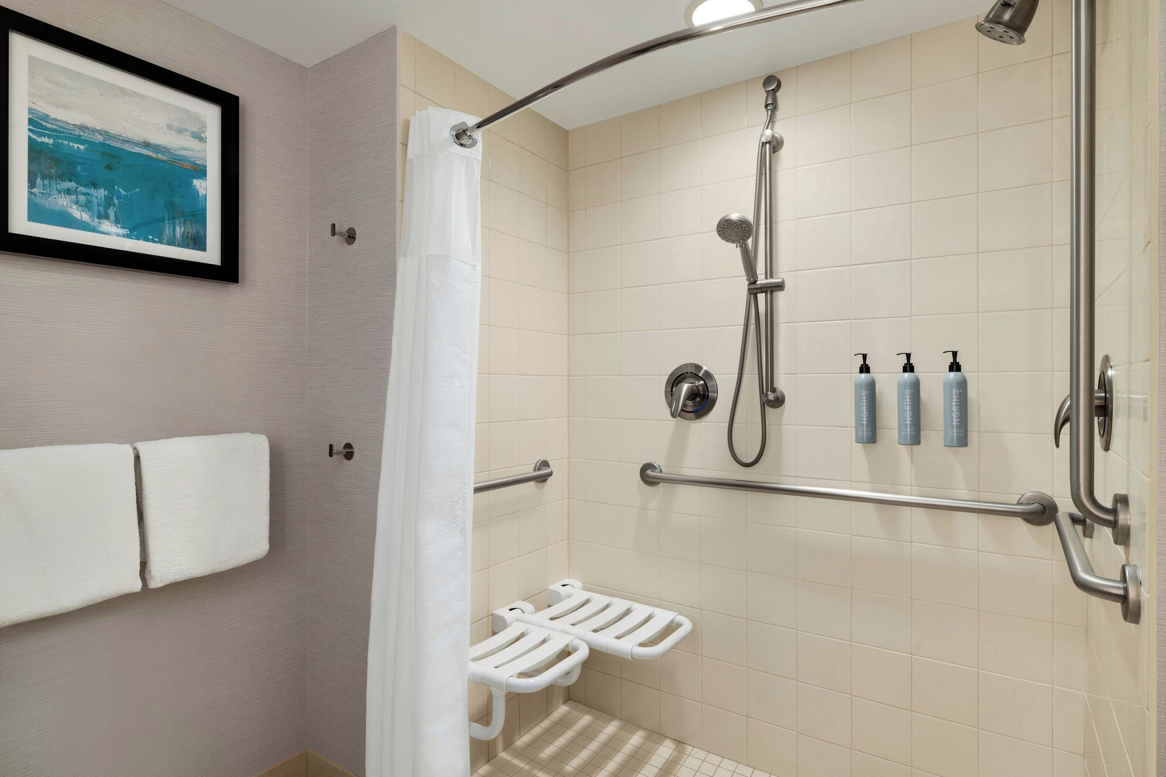 room, 1 king bed with sofa bed, oceanfront (mobility/hearing access, roll-in shwr) | bathroom | combined shower/bathtub, free toiletries, hair dryer, towels