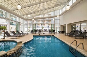 Indoor pool, open 10:00 AM to 10:00 PM, pool loungers
