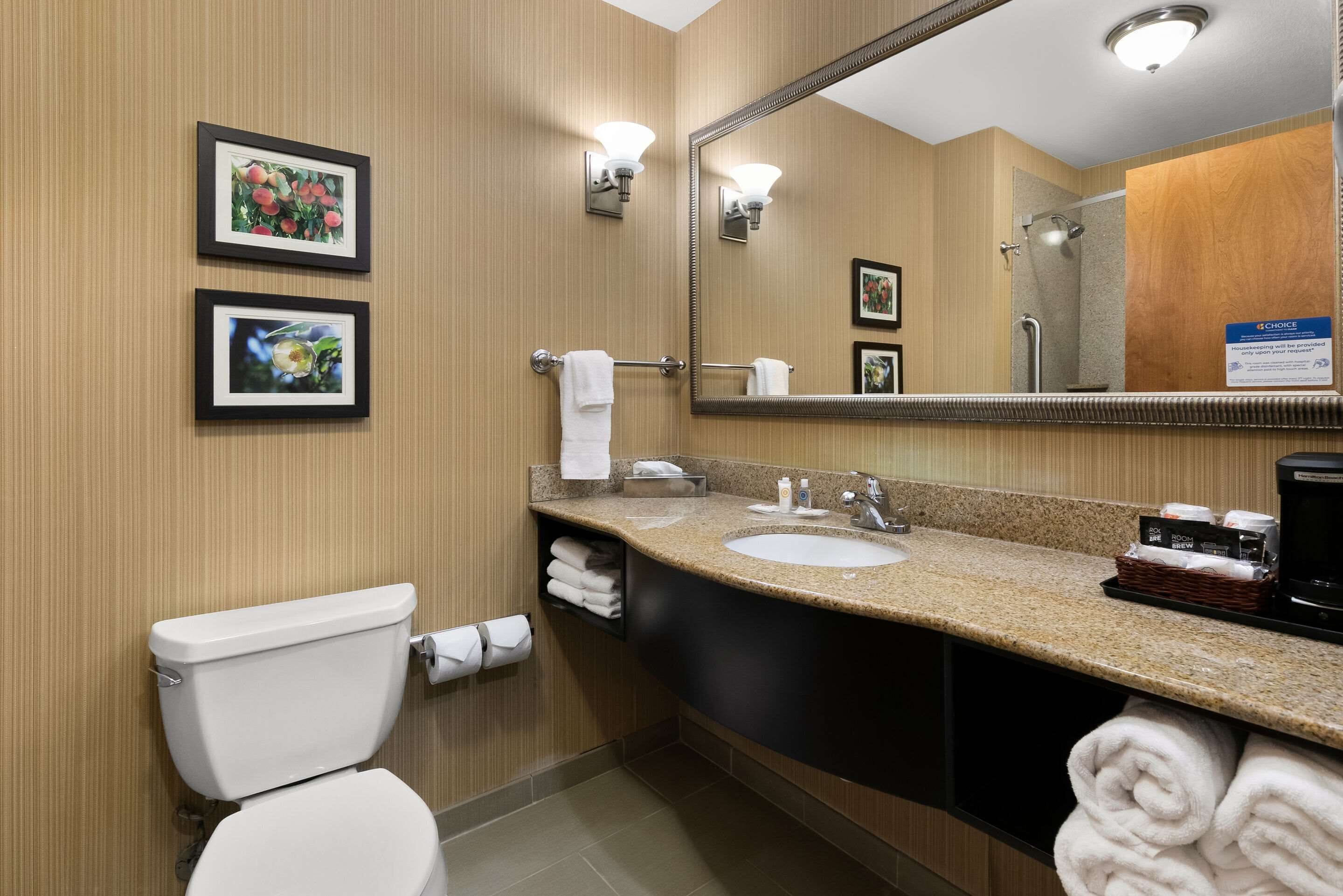 premium bedding, pillow-top beds, desk, laptop workspace