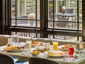 Enjoy a delicious breakfast in this inviting dining area with a view.