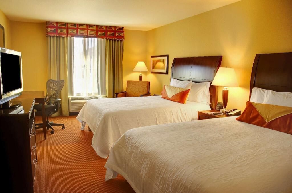 Premium bedding, down duvets, in-room safe, desk