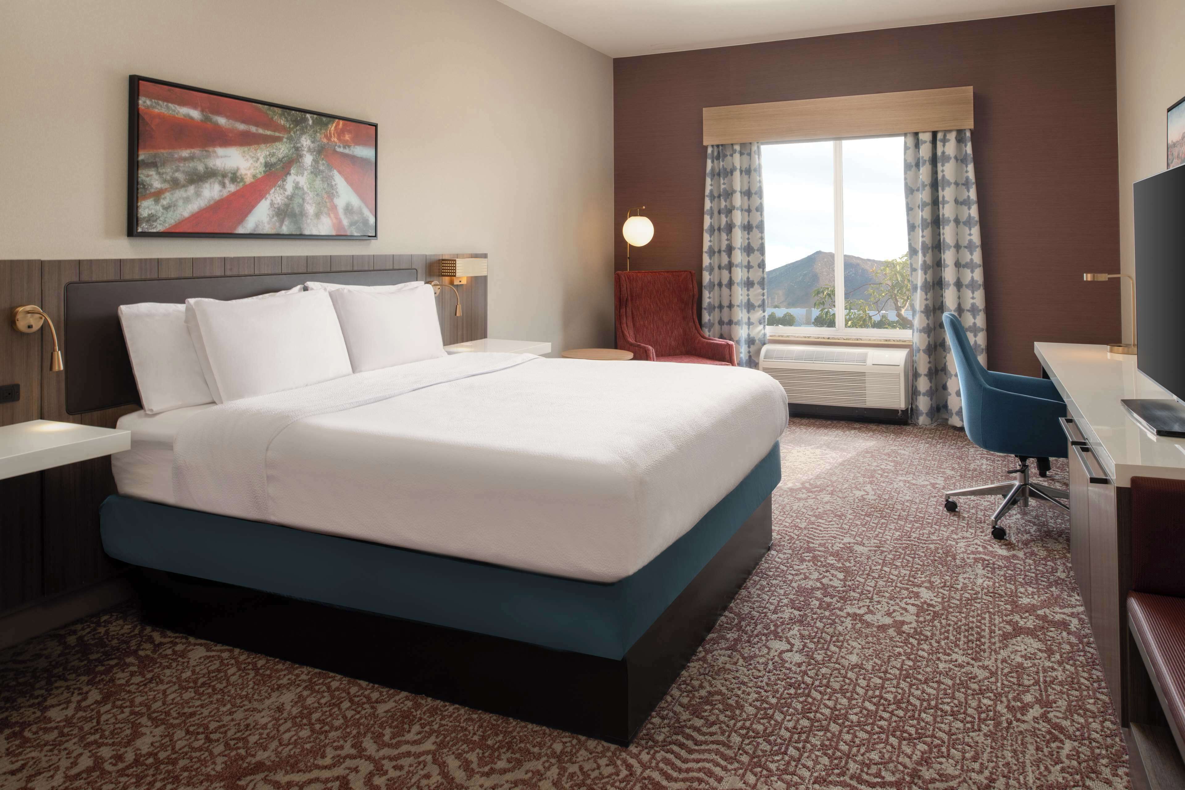 king evolution room | premium bedding, down duvets, in-room safe, desk