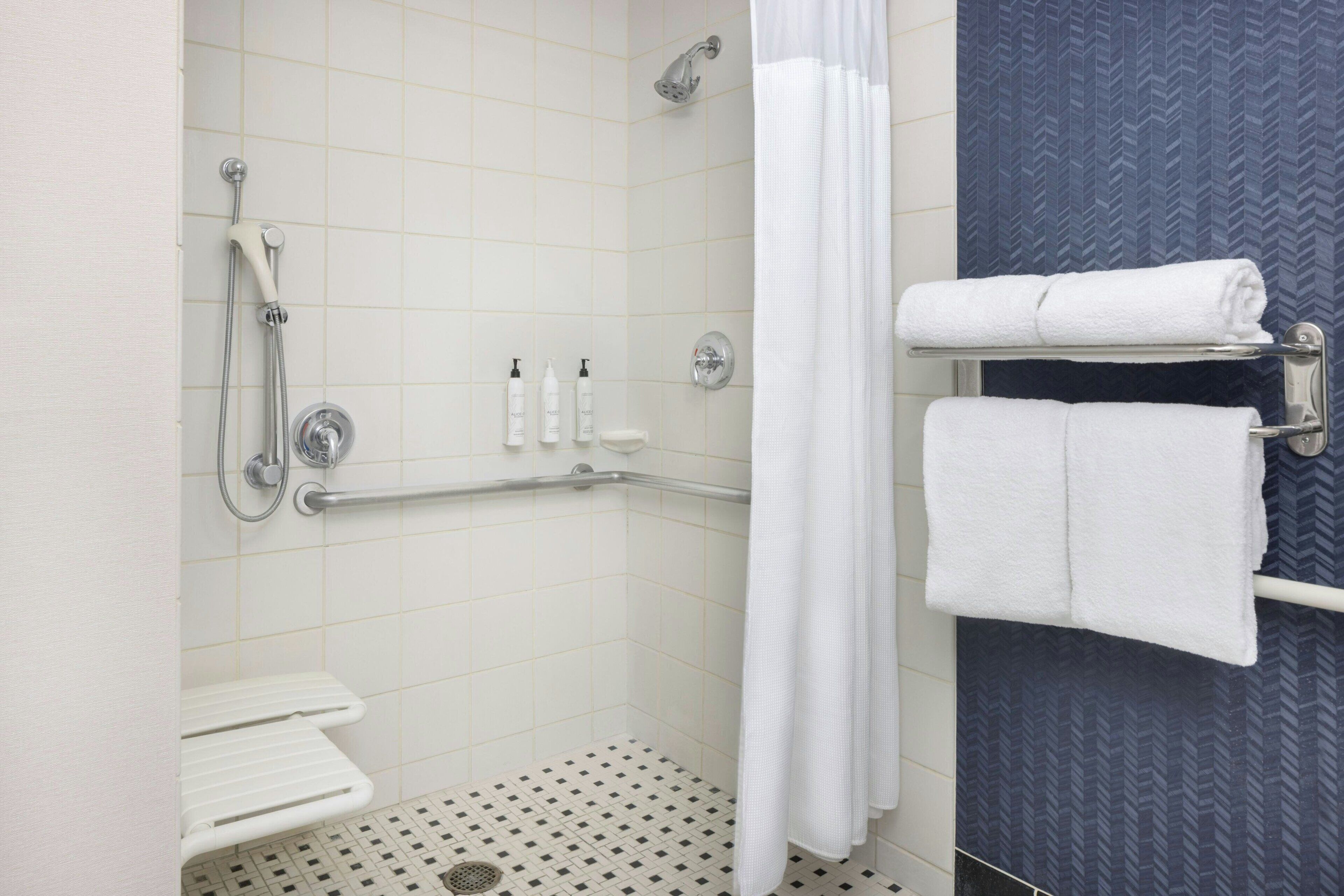 room, 1 king bed, non smoking (hearing accessible) | bathroom | free toiletries, hair dryer, towels, soap