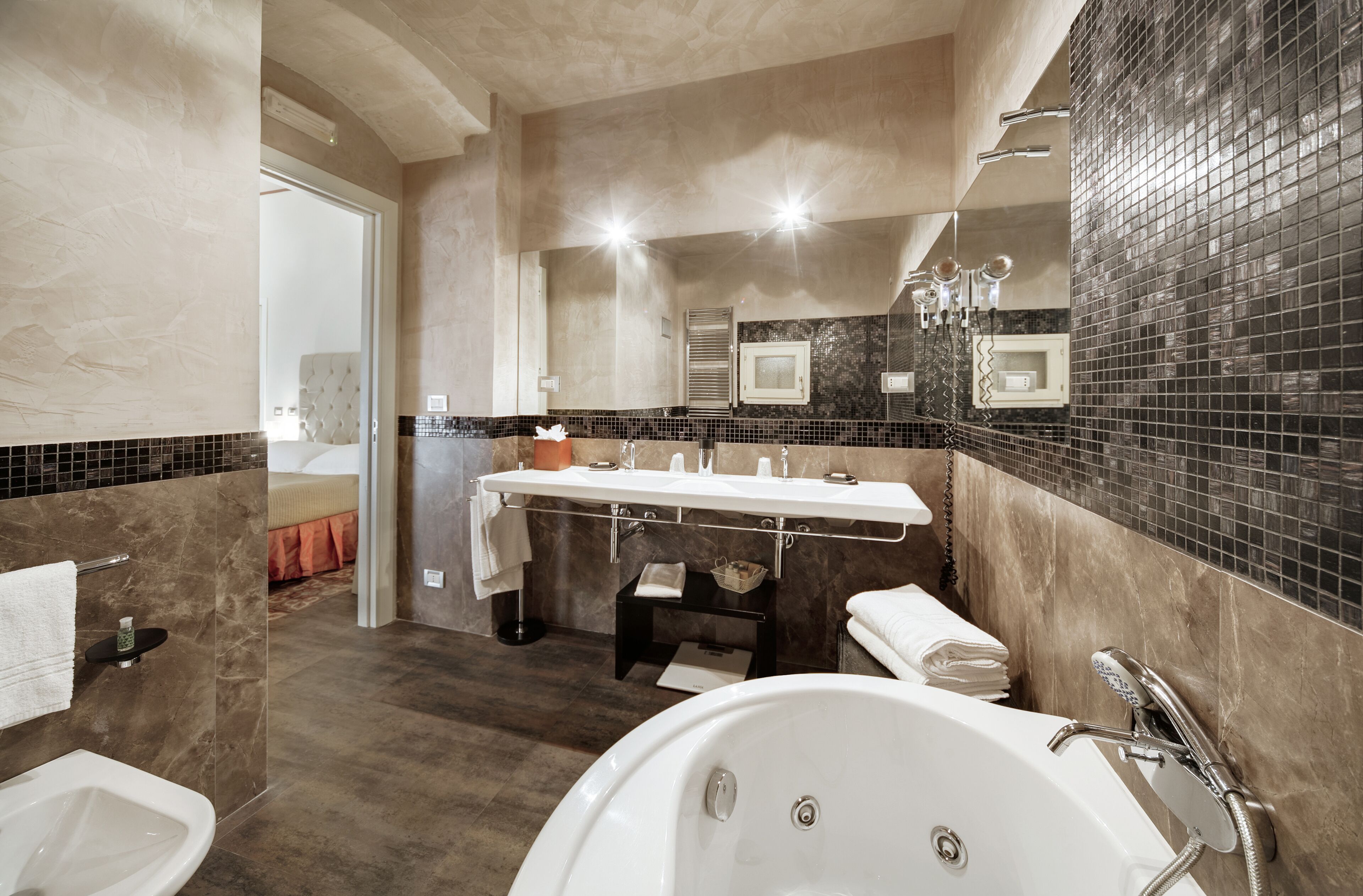 deluxe double room | bathroom | free toiletries, hair dryer, bathrobes, slippers