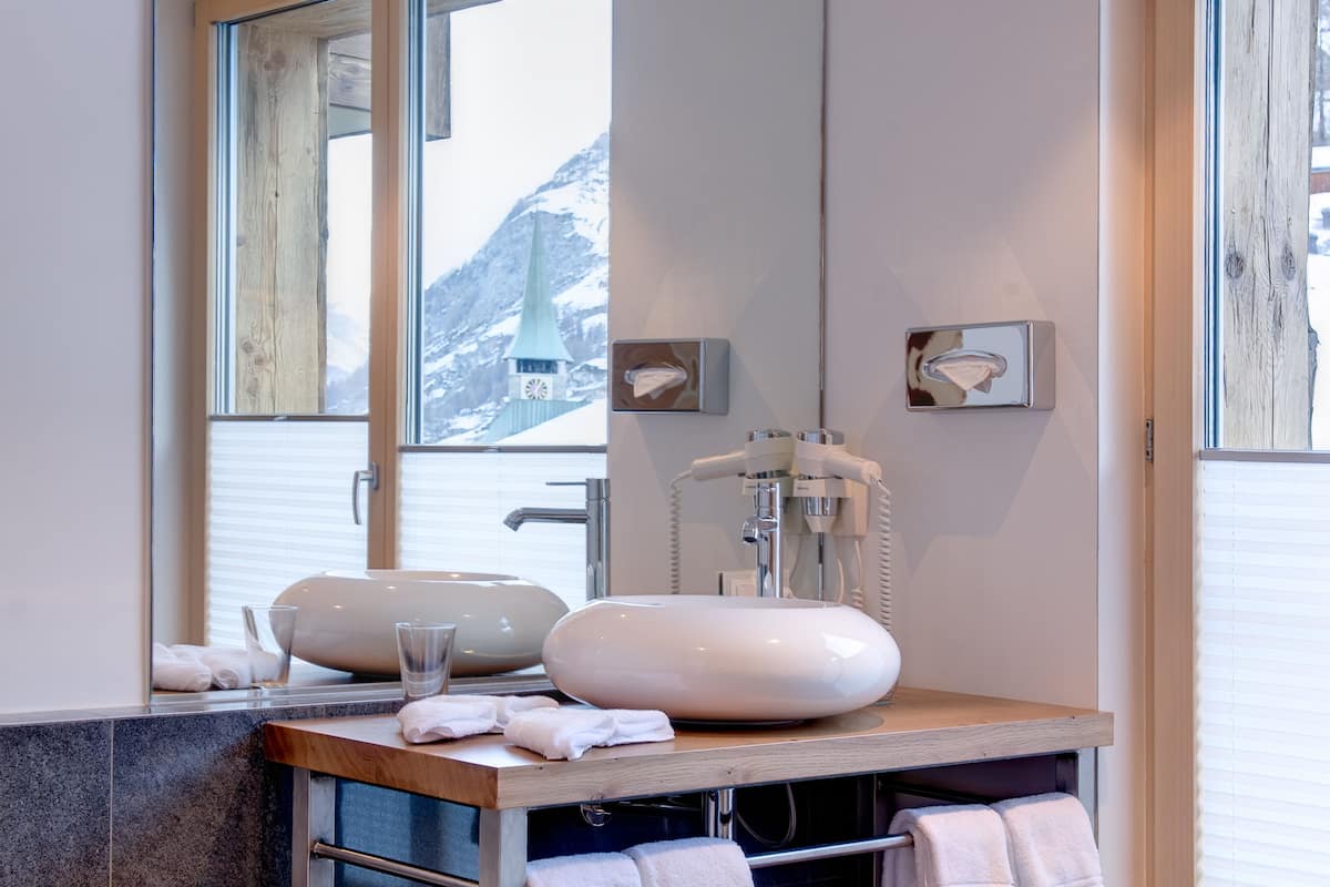chalet suite | bathroom | free toiletries, hair dryer, bathrobes, slippers