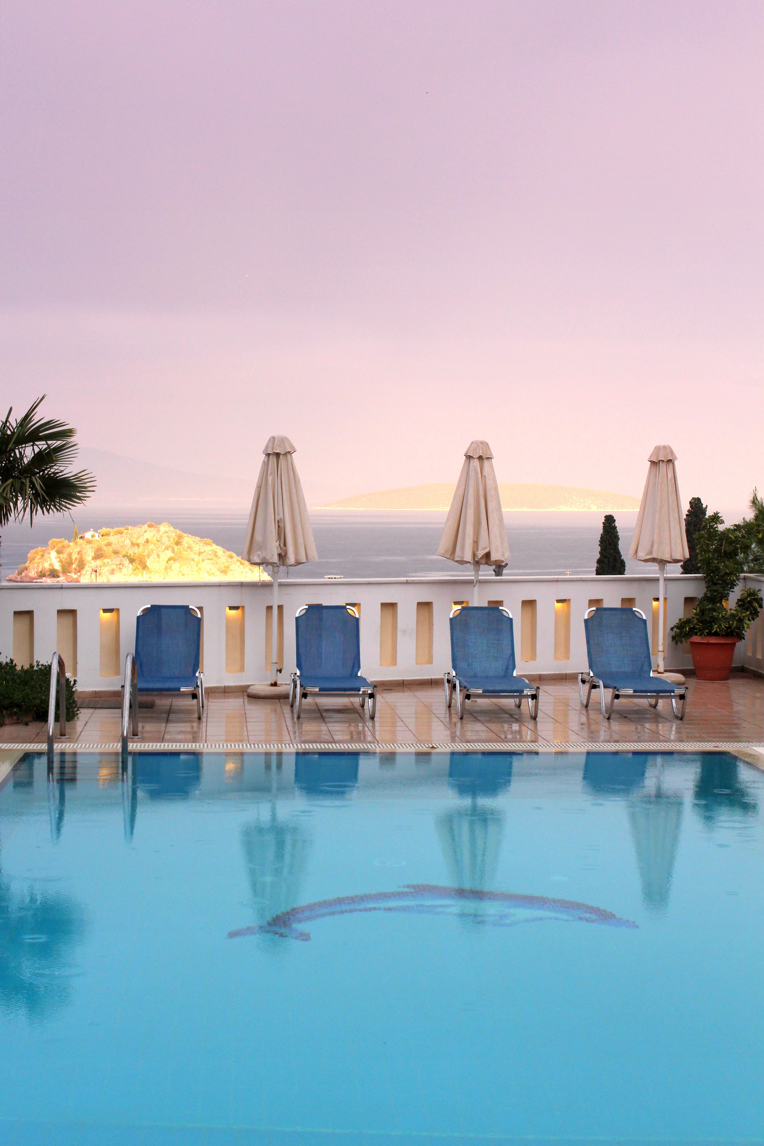 outdoor pool, pool umbrellas, pool loungers