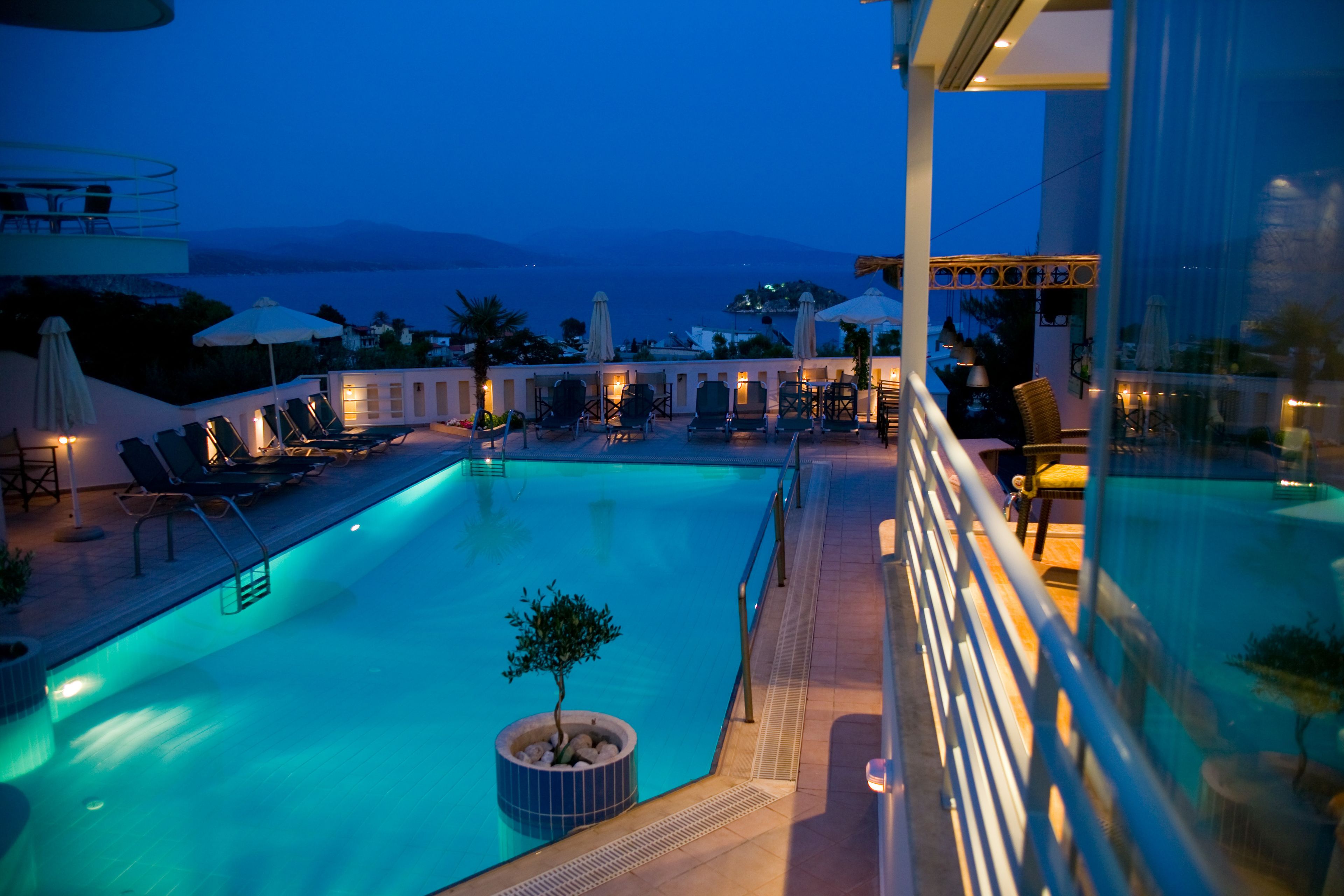 outdoor pool, pool umbrellas, pool loungers