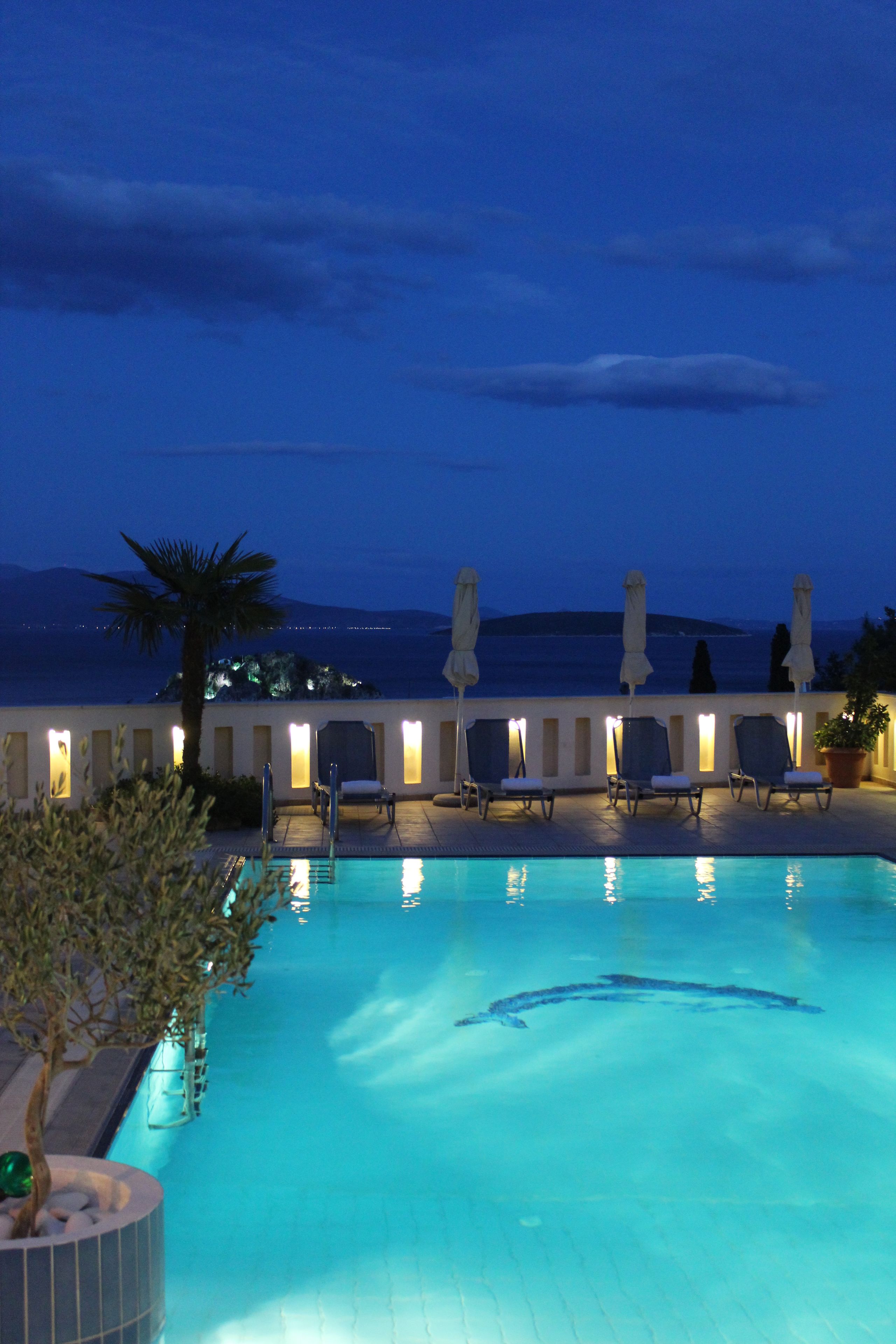 outdoor pool, pool umbrellas, pool loungers