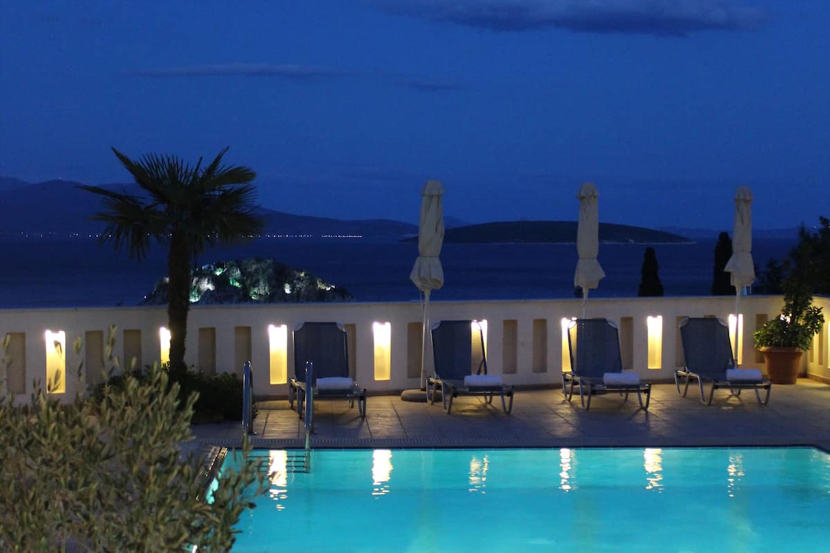 outdoor pool, pool umbrellas, pool loungers