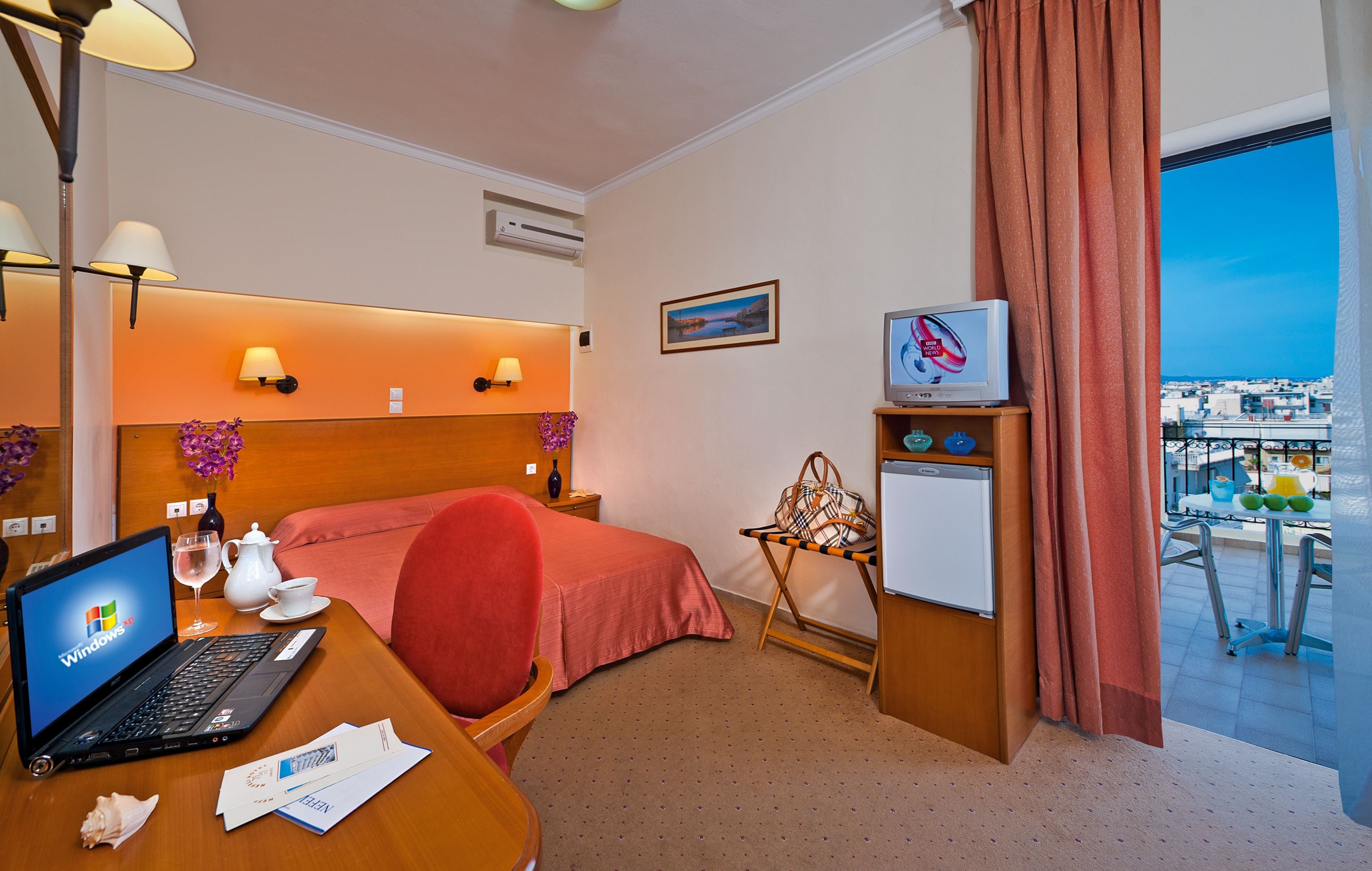 superior room | minibar, in-room safe, desk, iron/ironing board