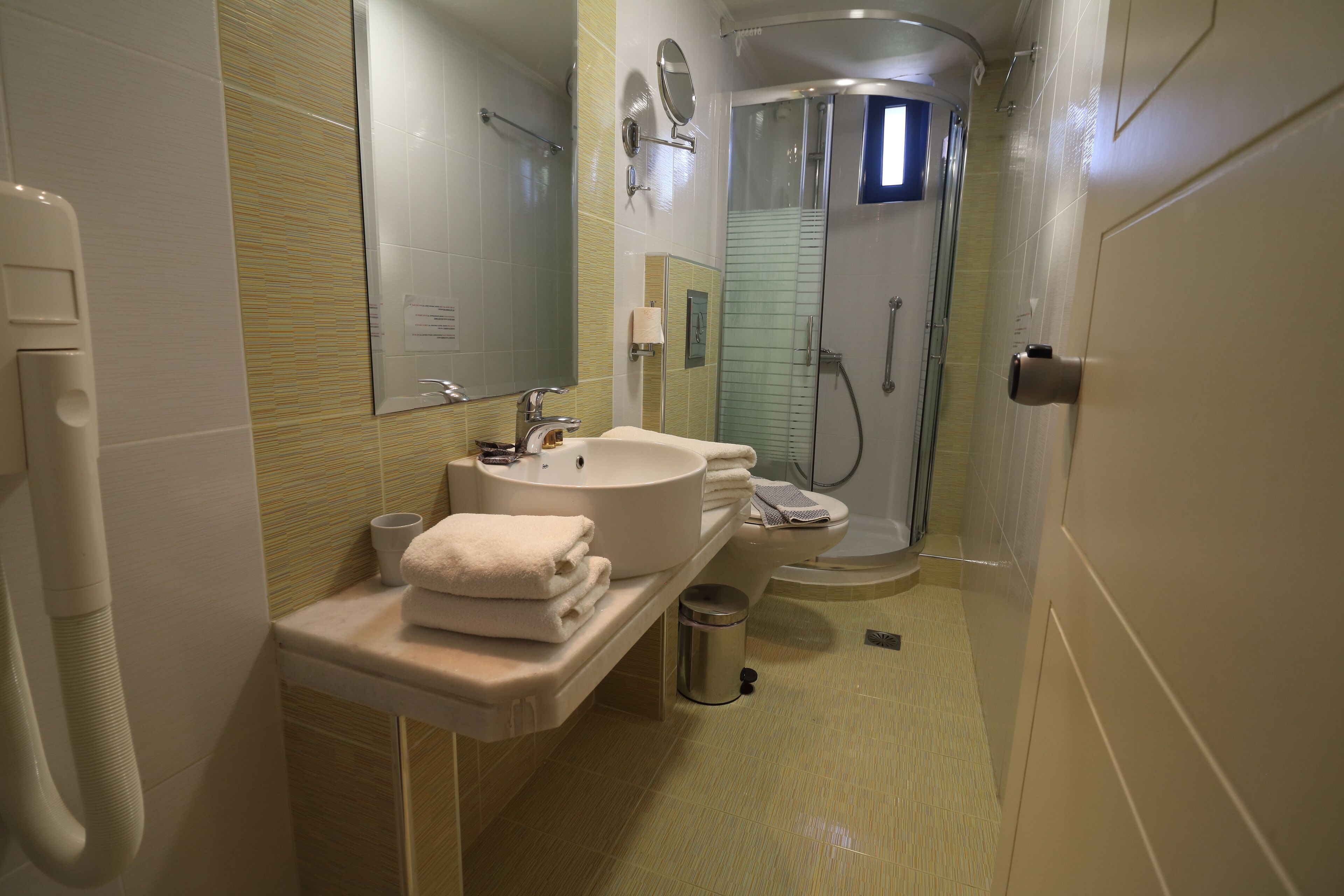 superior room | bathroom | shower, rainfall showerhead, free toiletries, hair dryer