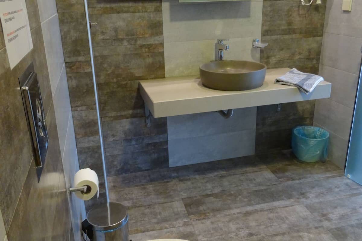 junior suite | bathroom | shower, rainfall showerhead, free toiletries, hair dryer