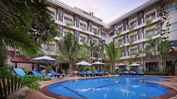 Indoor pool, open 7:30 AM to 11 PM, pool loungers