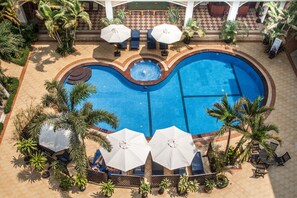 Indoor pool, open 7:30 AM to 11 PM, sun loungers - Angkor Holiday Hotel (Siem Reap)