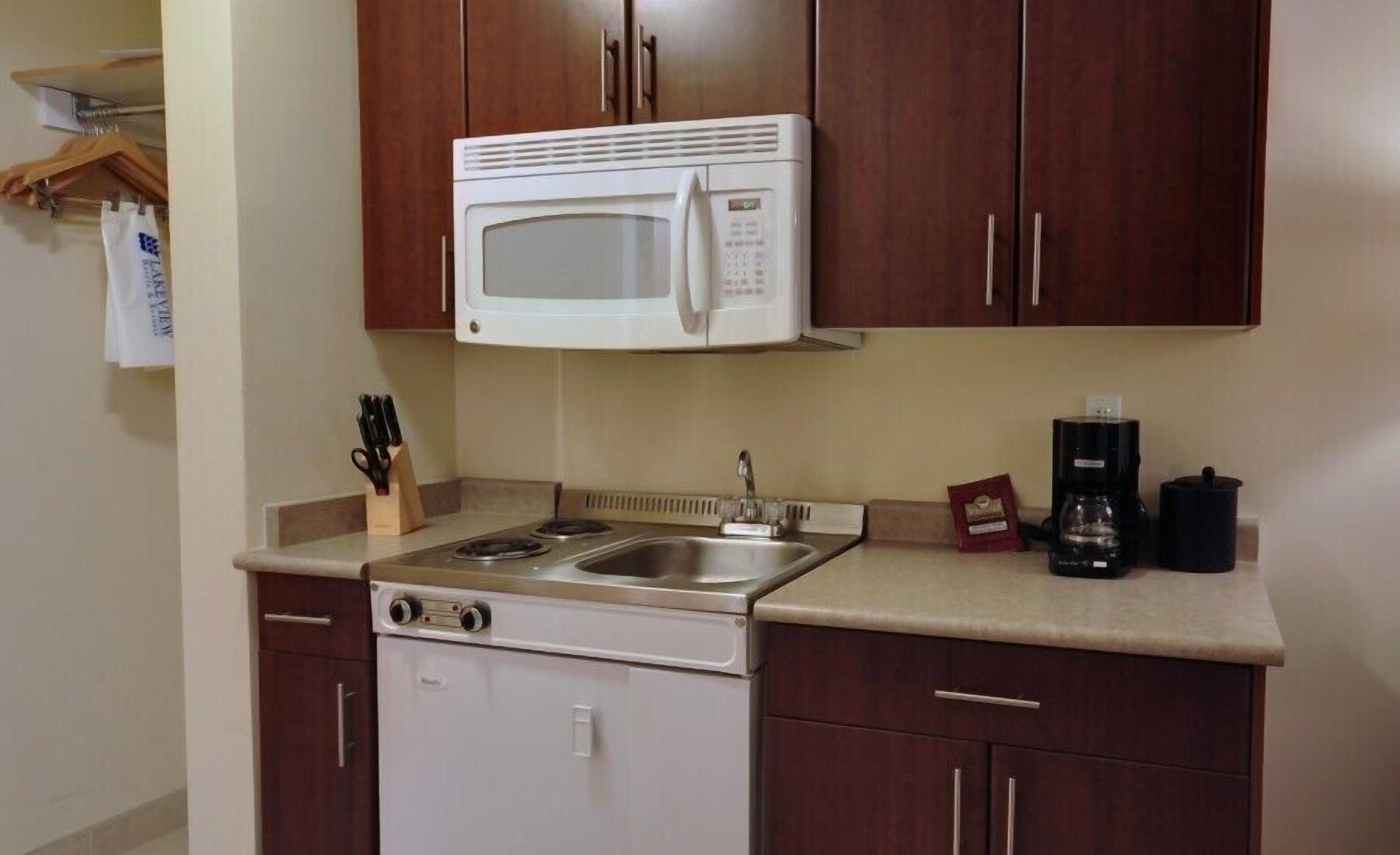 desk, blackout curtains, iron/ironing board, rollaway beds