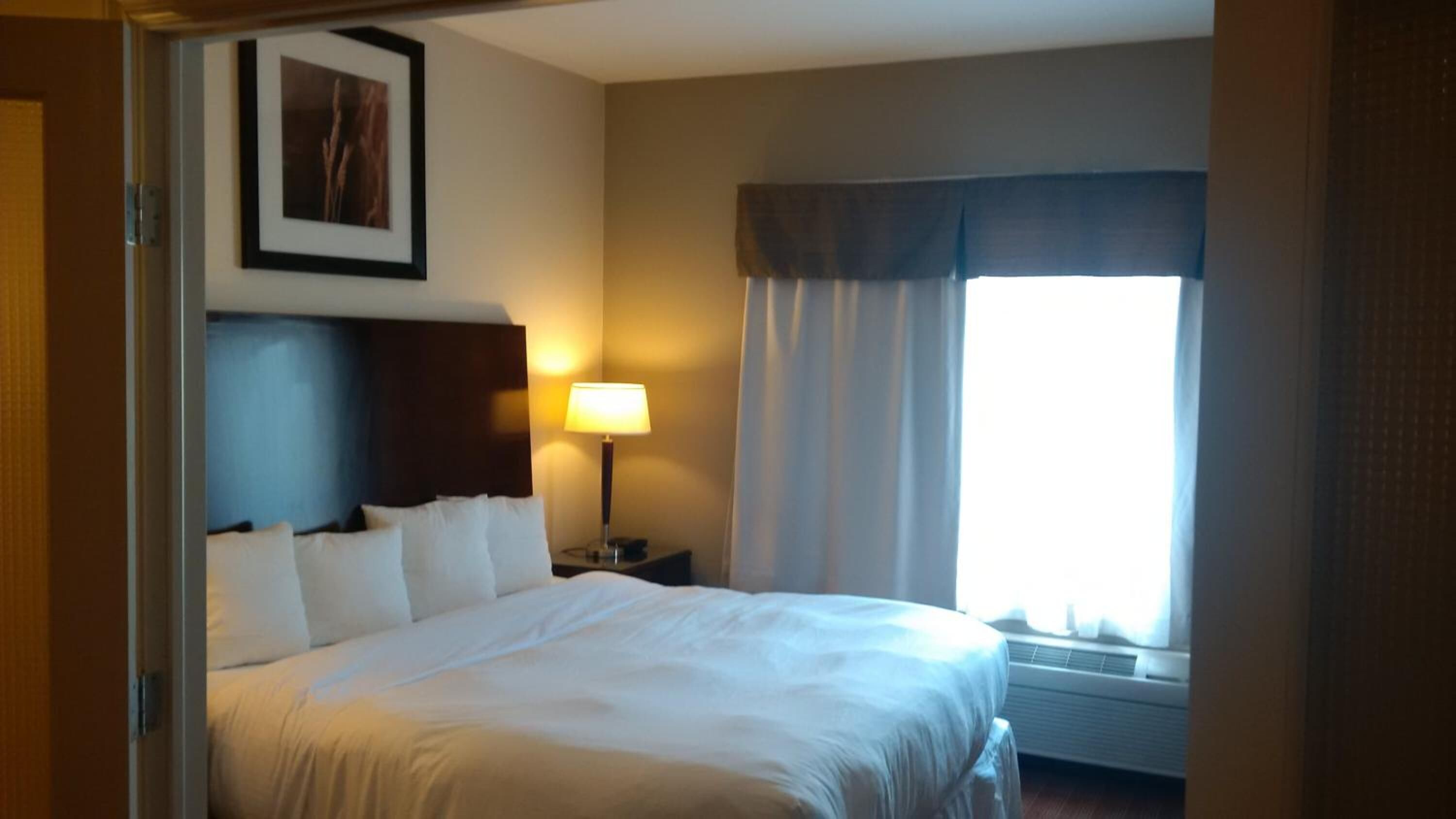 desk, blackout curtains, iron/ironing board, rollaway beds