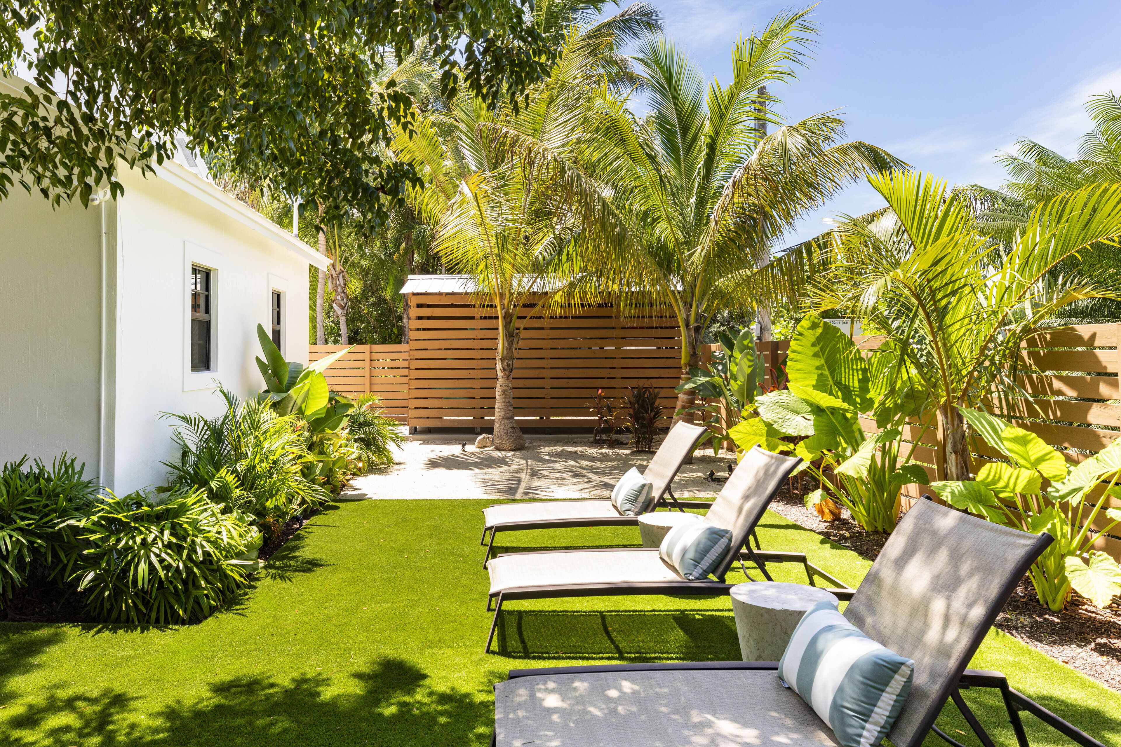 superior room, multiple beds, garden view | egyptian cotton sheets, premium bedding, pillow-top beds, in-room safe