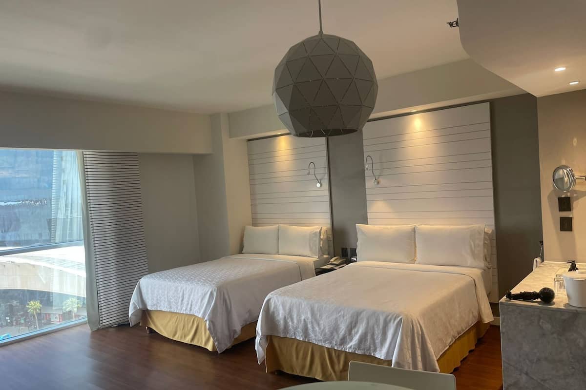 Suite, 2 Double Beds, Non Smoking | 1 bedroom, in-room safe, laptop workspace, blackout drapes