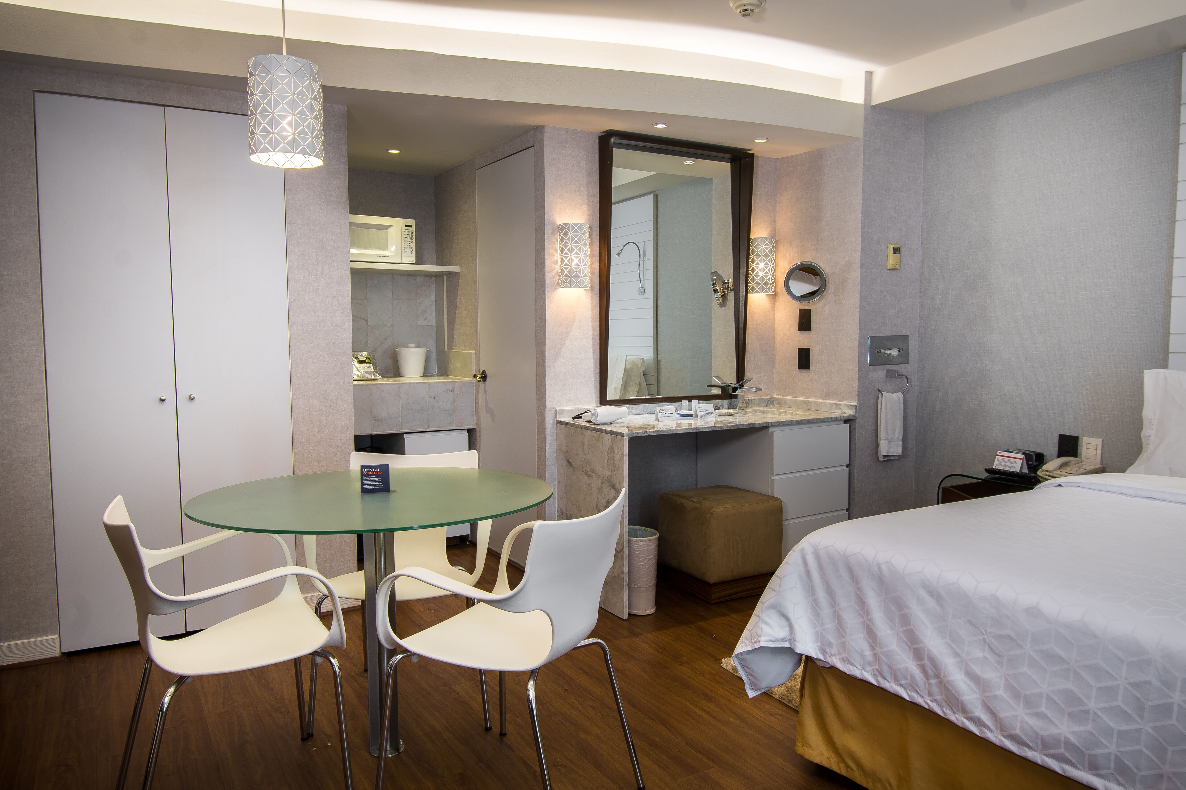 family room, multiple beds | 1 bedroom, in-room safe, desk, laptop workspace